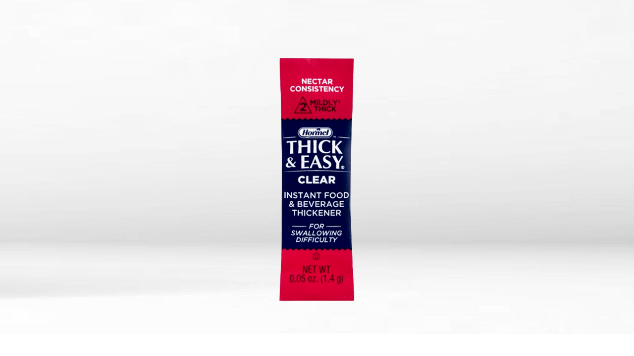 Thick and Easy Clear Thickener in packet nectar consistency on table