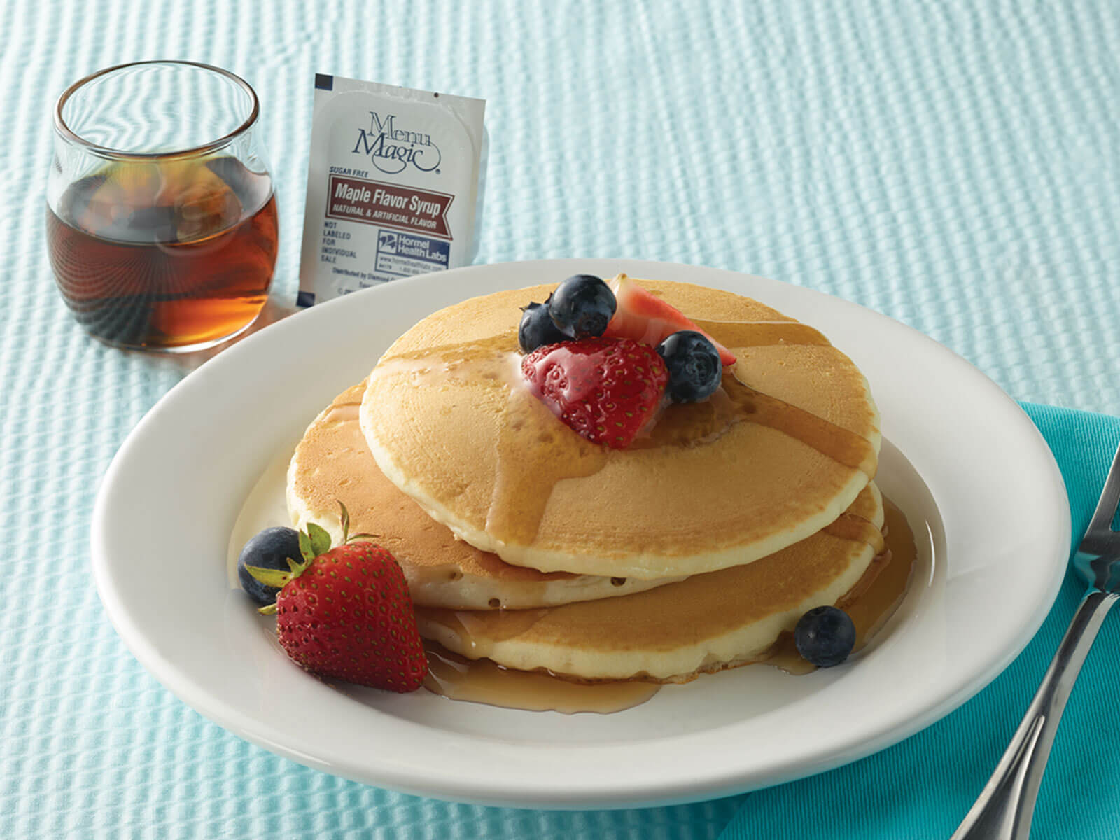 Hormel Health Labs Menu Magic Condiment syrup on pancakes