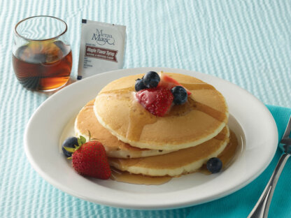 Hormel Health Labs Menu Magic Condiment syrup on pancakes