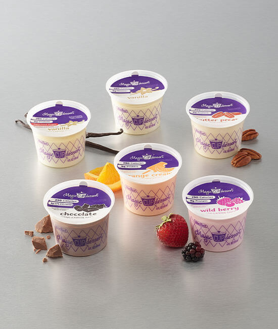 All six magic cup flavors sitting on a stainless steel tabletop