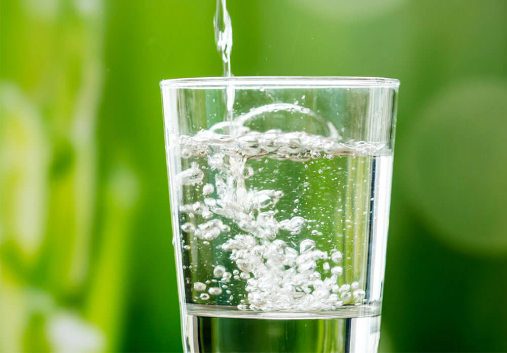 Water pouring into a glass