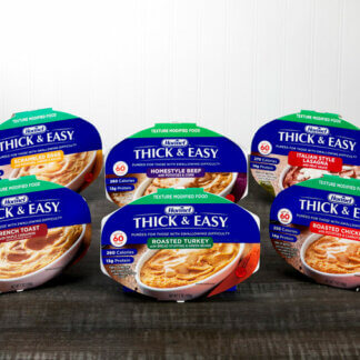 A group of Thick and Easy Pureed meals sitting on a table