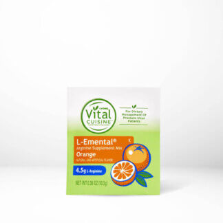 Hormel Vital Cuisine L-emental orange flavor packet on table
